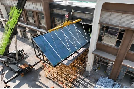Large framed panel during lifting