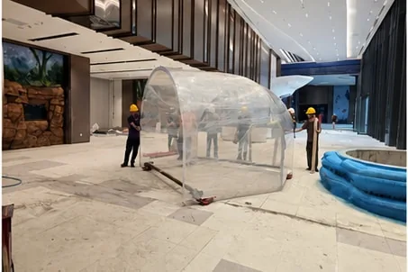Curved acrylic assembly at the installation site