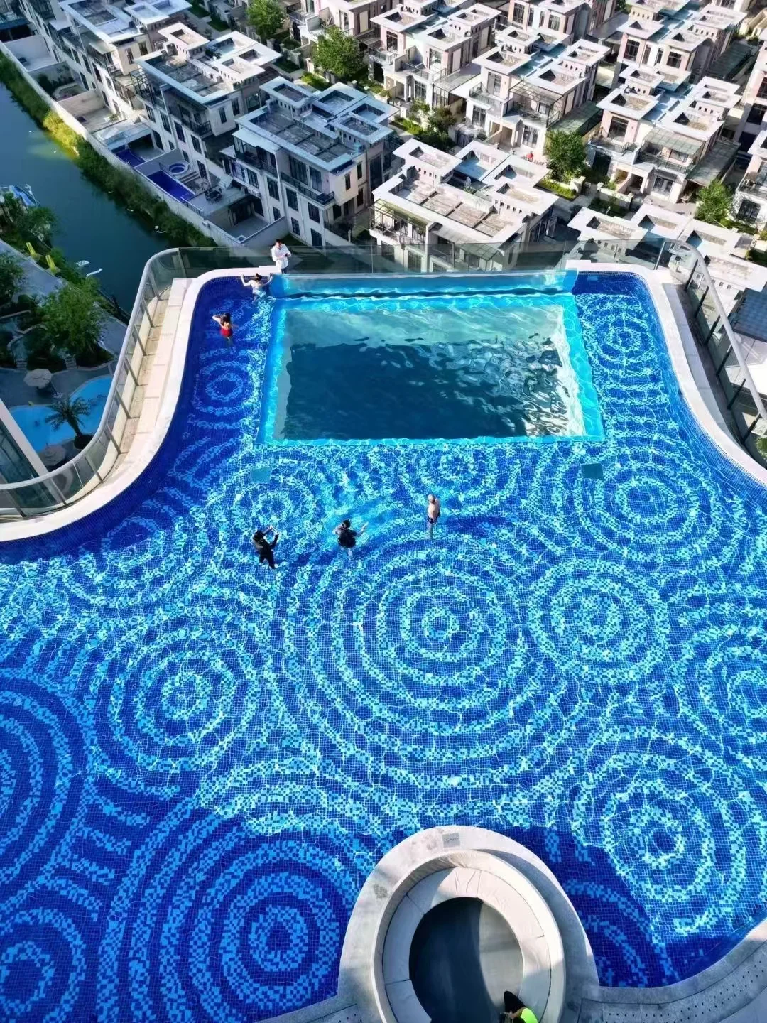 Overhead view of the Huizhou pool and surrounding building.